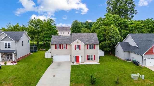 1053 Hupps Hill Ln, Forest, VA 24551 - traditional-style home with driveway, central AC, a garage, and a front yard