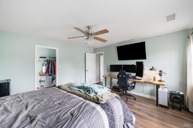 1053 Hupps Hill Ln, Forest, VA 24551 - bedroom featuring wood finished floors, an office area, a ceiling fan, and baseboards
