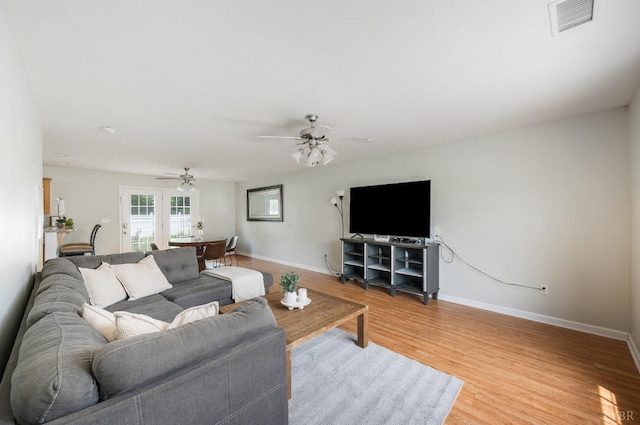 1053 Hupps Hill Ln, Forest, VA 24551 - living area with a ceiling fan, baseboards, and light wood finished floors
