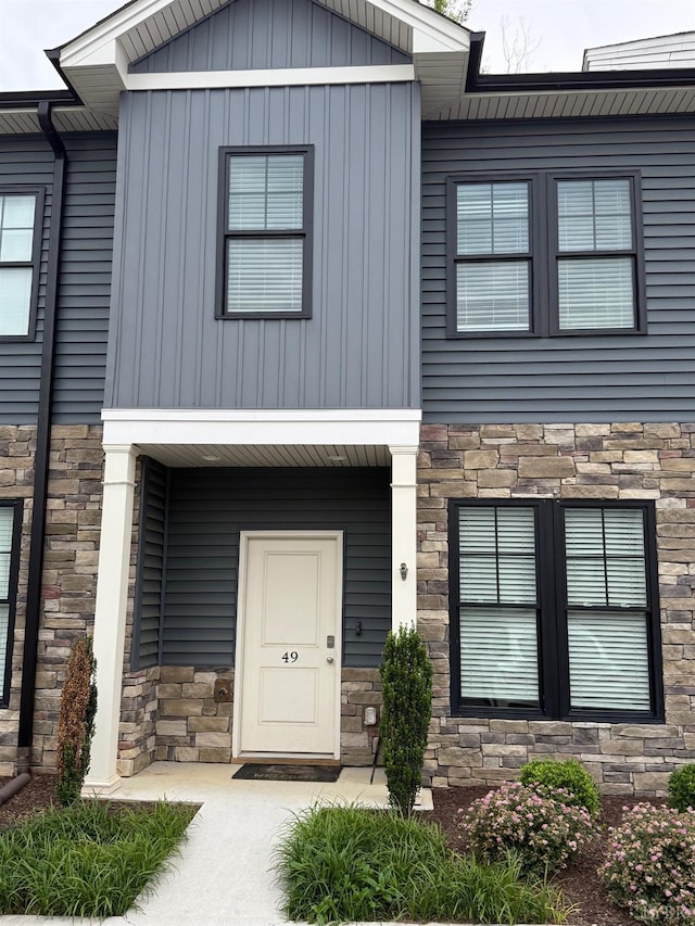 49 Cuddington Ln, Lynchburg, VA 24501 - view of front of property featuring stone siding, board and batten siding, and french doors