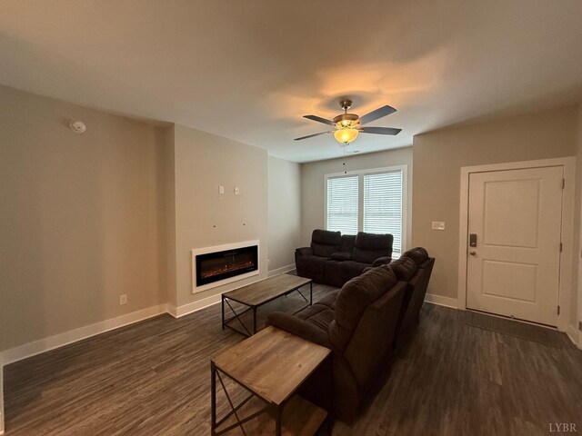 49 Cuddington Ln, Lynchburg, VA 24501 - living room with dark wood-style flooring, baseboards, a glass covered fireplace, and ceiling fan