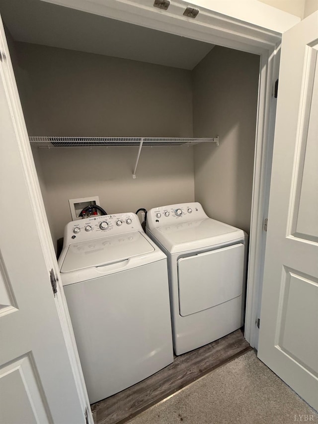 49 Cuddington Ln, Lynchburg, VA 24501 - washroom featuring washing machine and clothes dryer and wood finished floors
