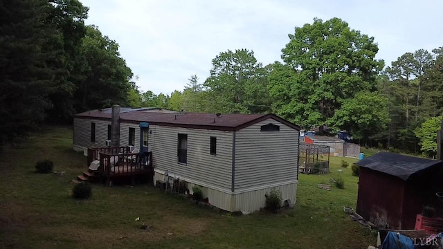 134 Napier Dr, Concord, VA 24538 - back of property with a yard and a deck