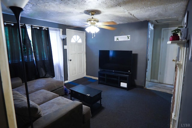 134 Napier Dr, Concord, VA 24538 - living room with ceiling fan, baseboards, and a textured ceiling