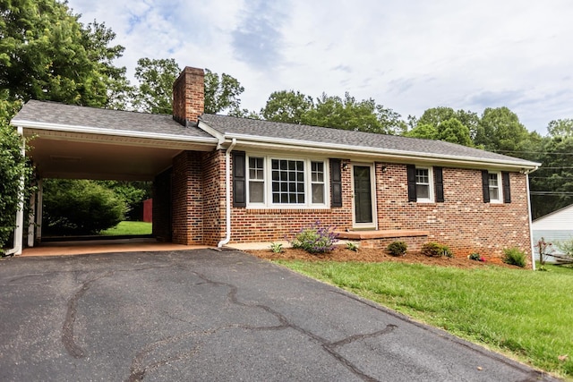 1592 Purdum Mill Rd, Appomattox, VA 24522 - ranch-style home with a chimney, brick siding, a front yard, and asphalt driveway