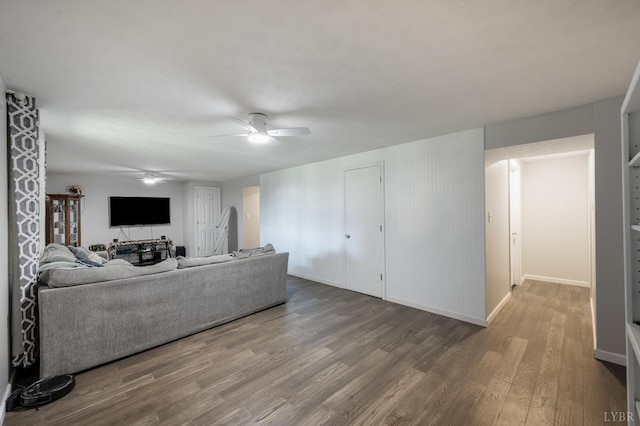 343 Soybean Dr, Appomattox, VA 24522 - living room featuring ceiling fan, wood finished floors, and baseboards