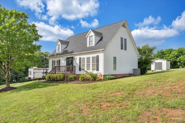 1028 Park Mountain Ter, Huddleston, VA 24104 - view of front of home featuring a front yard, a deck, and roof with shingles