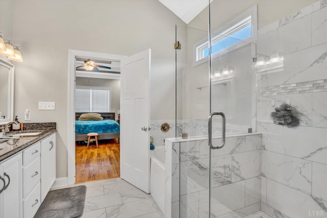 238 Ridgeline Dr, Concord, VA 24538 - ensuite bathroom featuring marble look tile flooring, a stall shower, vanity, a bath, and a ceiling fan