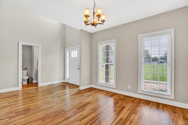 238 Ridgeline Dr, Concord, VA 24538 - foyer entrance featuring a chandelier, light wood-style floors, and baseboards