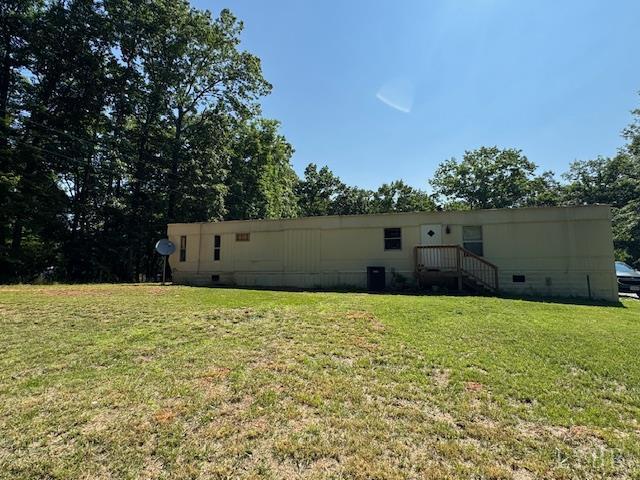7447 Red House Rd, Appomattox, VA 24522 - back of house with a lawn