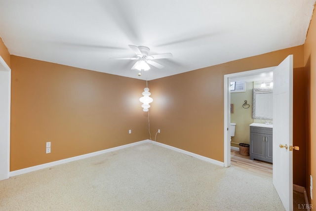 1129 Croft Ln, Bedford, VA 24523 - unfurnished bedroom with light colored carpet, baseboards, and ensuite bathroom