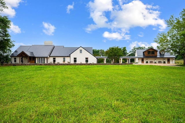 7845 Bear Creek Rd, Gladys, VA 24554 - view of front of property with a metal roof, a front yard, a chimney, and a standing seam roof