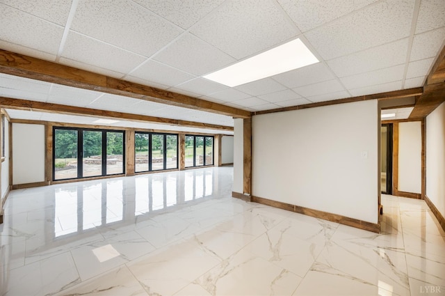 7845 Bear Creek Rd, Gladys, VA 24554 - unfurnished room with a paneled ceiling and light marble finish flooring