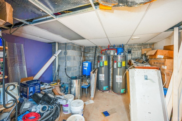 7845 Bear Creek Rd, Gladys, VA 24554 - below grade area with electric water heater, a paneled ceiling, a water pressure tank, and concrete block wall