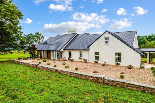 7845 Bear Creek Rd, Gladys, VA 24554 - rear view of property featuring a standing seam roof, a metal roof, and a chimney