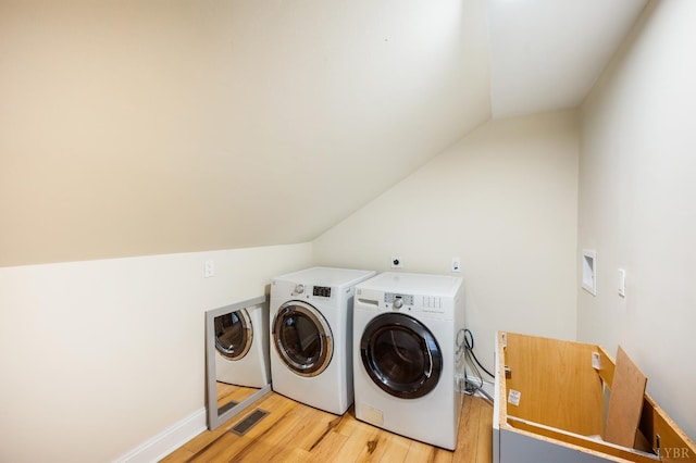 7845 Bear Creek Rd, Gladys, VA 24554 - washroom featuring washer and dryer and light wood-type flooring