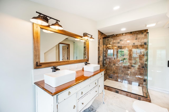 7845 Bear Creek Rd, Gladys, VA 24554 - bathroom featuring double vanity, a stall shower, and recessed lighting