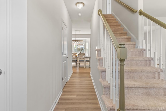 189 Traverse Dr, Evington, VA 24550 - stairs featuring wood finished floors and baseboards