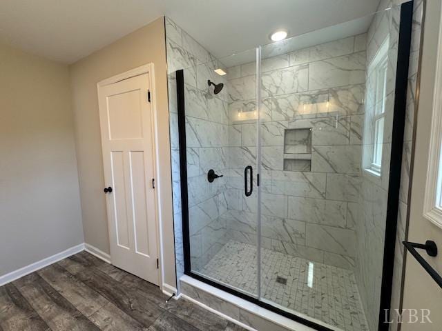 2304 Spring Grove Rd, Spout Spring, VA 24593 - bathroom featuring wood finished floors, a marble finish shower, baseboards, and recessed lighting