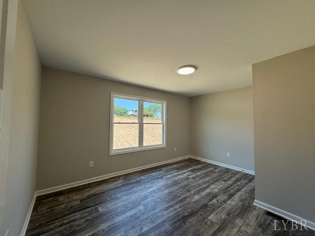 2304 Spring Grove Rd, Spout Spring, VA 24593 - unfurnished room with dark wood finished floors and baseboards