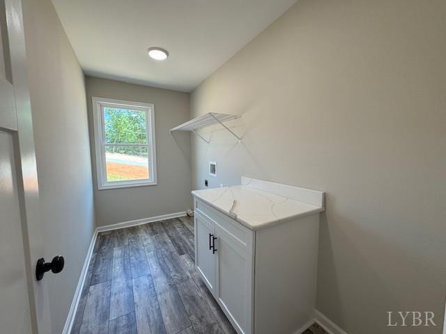 2304 Spring Grove Rd, Spout Spring, VA 24593 - laundry room featuring hookup for an electric dryer, dark wood-style flooring, baseboards, cabinet space, and washer hookup