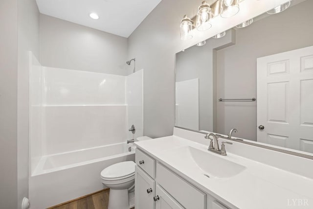 419 Wadsworth St, Lynchburg, VA 24501 - bathroom featuring vanity, wood finished floors, and bathing tub / shower combination