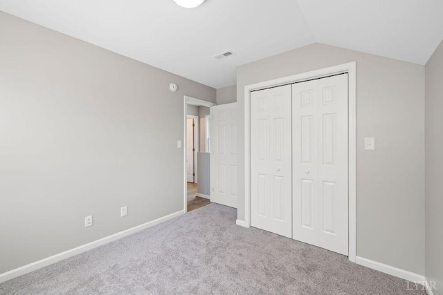419 Wadsworth St, Lynchburg, VA 24501 - unfurnished bedroom with carpet flooring, a closet, and vaulted ceiling