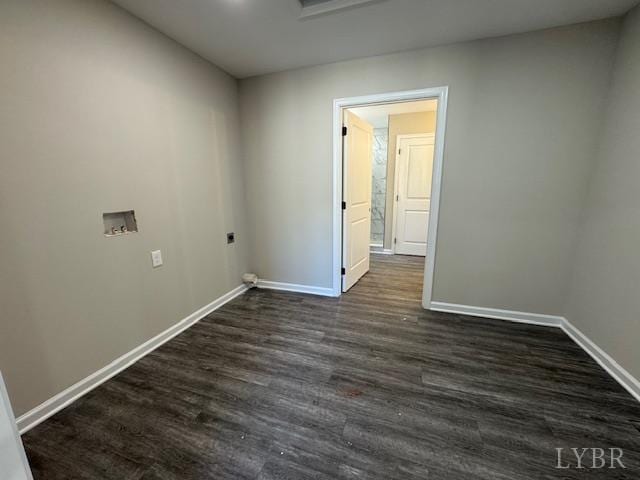 2350 Spring Grove Rd, Spout Spring, VA 24593 - spare room featuring baseboards and dark wood-style flooring