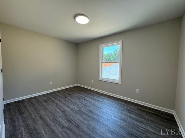 2350 Spring Grove Rd, Spout Spring, VA 24593 - unfurnished room with dark wood-style flooring and baseboards