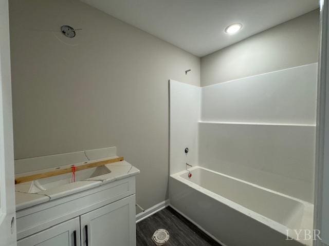 2350 Spring Grove Rd, Spout Spring, VA 24593 - full bathroom featuring vanity, wood finished floors, baseboards, and  shower combination