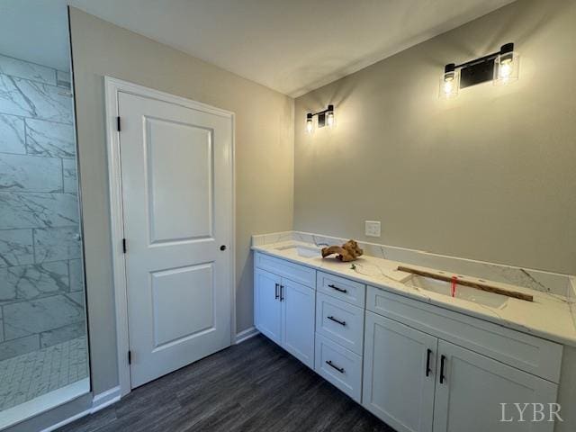 2350 Spring Grove Rd, Spout Spring, VA 24593 - full bathroom featuring wood finished floors, tiled shower, and double vanity