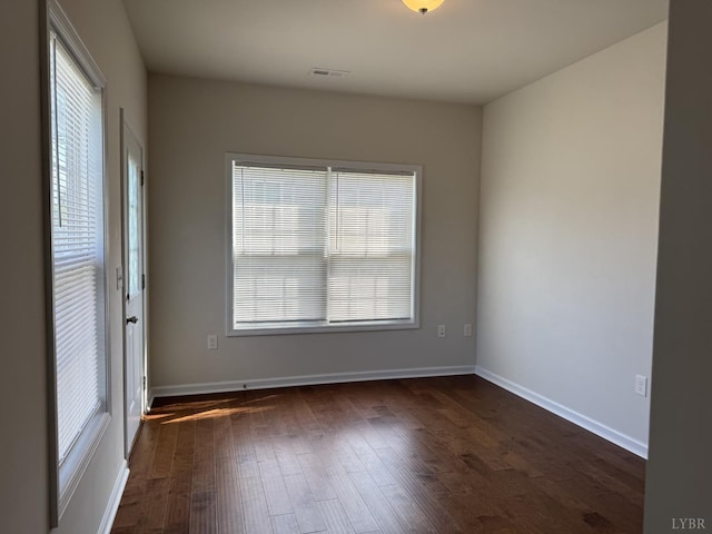 1049 Old Trail Rd, Forest, VA 24551 - spare room featuring healthy amount of natural light, dark wood-style floors, and baseboards