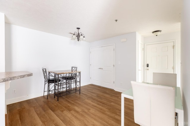 100 Capstone Dr Unit 207, Lynchburg, VA 24502 - dining area featuring wood finished floors and a chandelier