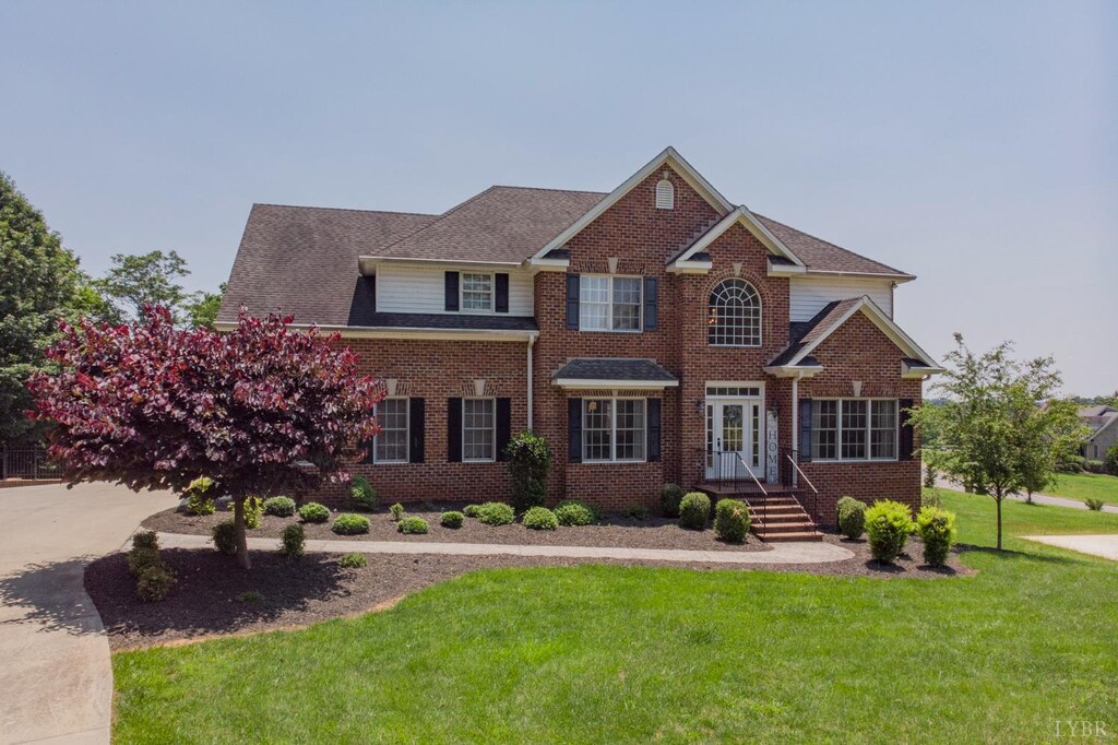 816 Ivy Lake Dr, Forest, VA 24551 - view of front of property featuring brick siding and a front yard