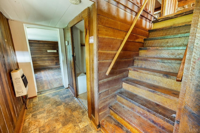 1807 Wheats Valley Rd, Bedford, VA 24532 - stairs with heating unit, wooden walls, and stone finish floors