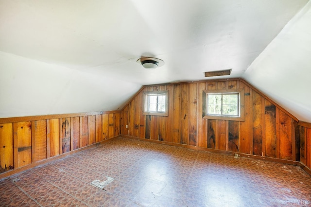 1807 Wheats Valley Rd, Bedford, VA 24532 - additional living space with wooden walls, vaulted ceiling, and tile patterned floors