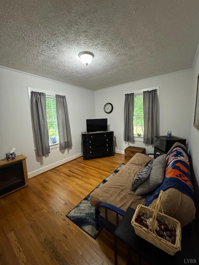 100 New Chapel Rd, Rustburg, VA 24588 - bedroom with a textured ceiling and wood finished floors