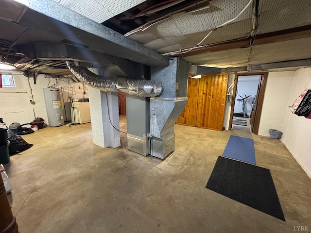 100 New Chapel Rd, Rustburg, VA 24588 - below grade area featuring electric water heater, washer / clothes dryer, and heating unit