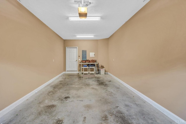 1066 Siesta Key Ct, Moneta, VA 24121 - garage featuring electric panel, a garage door opener, and baseboards