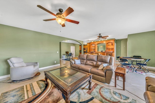 1066 Siesta Key Ct, Moneta, VA 24121 - living area with a ceiling fan, arched walkways, and baseboards