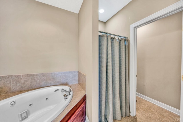 1066 Siesta Key Ct, Moneta, VA 24121 - bathroom featuring a jetted tub, tile patterned floors, a shower with curtain, and baseboards