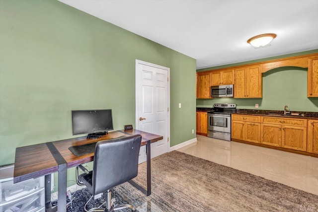 1066 Siesta Key Ct, Moneta, VA 24121 - home office featuring a sink, light tile patterned flooring, and baseboards