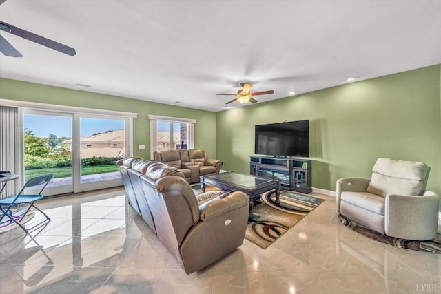 1066 Siesta Key Ct, Moneta, VA 24121 - living area featuring ceiling fan, recessed lighting, light marble finish flooring, and baseboards