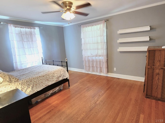 610 Dumas St, Lynchburg, VA 24502 - bedroom featuring ornamental molding, baseboards, wood finished floors, and a ceiling fan