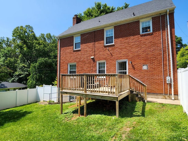 610 Dumas St, Lynchburg, VA 24502 - back of property with a chimney, a wooden deck, and brick siding