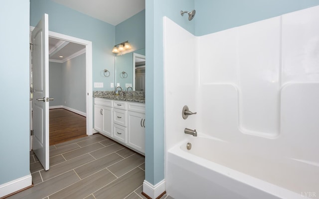 1032 Wiggington Rd, Lynchburg, VA 24502 - full bath featuring double vanity, wood finish floors, shower / washtub combination, and ornamental molding