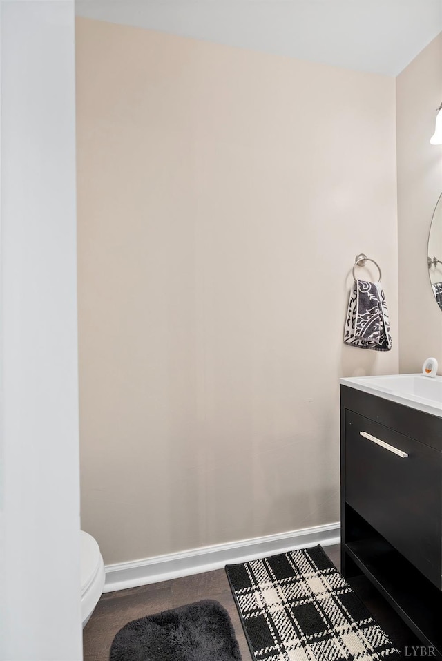 1810 Broadway St Unit 100, Lynchburg, VA 24501 - bathroom with vanity, baseboards, and toilet