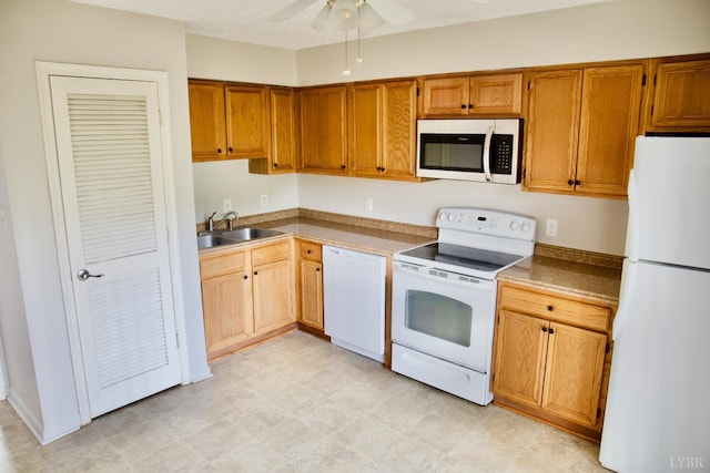 8022 Timberlake Rd Unit 15, Lynchburg, VA 24502 - kitchen with white appliances, a sink, ceiling fan, and brown cabinetry