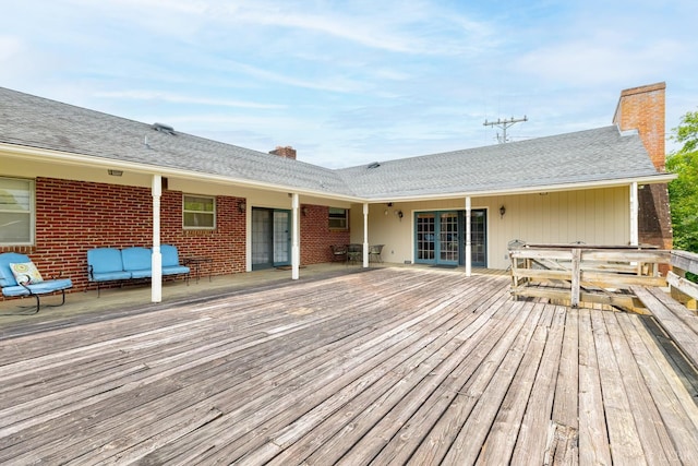 1094 Pigeon Run Rd, Gladys, VA 24554 - wooden deck with french doors and an outdoor living space