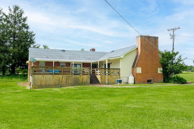 1094 Pigeon Run Rd, Gladys, VA 24554 - back of property featuring a chimney, a wooden deck, and a lawn